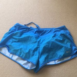 Blue nike running shorts